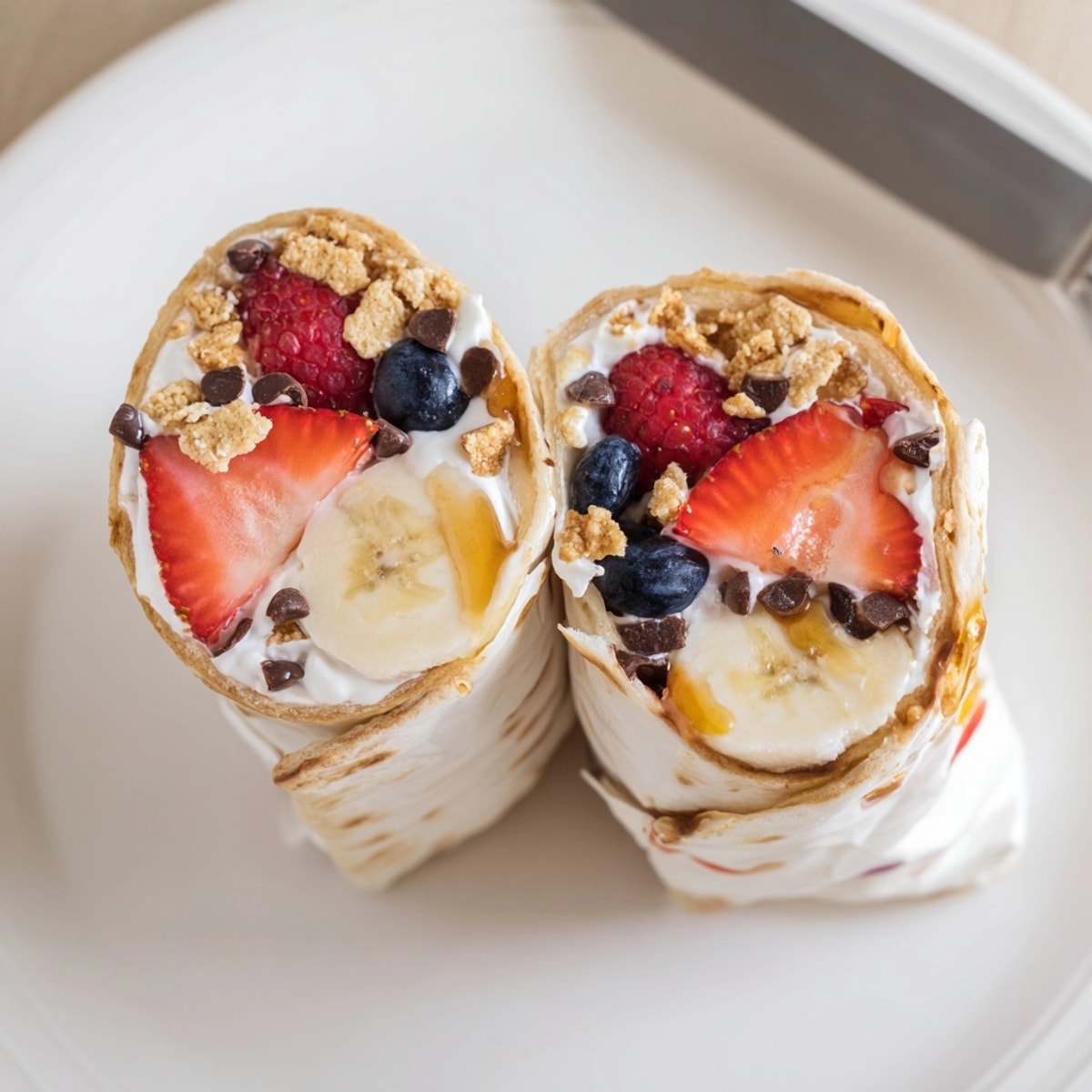 Golden-brown Cinnamon Toast Crunch Breakfast Wraps, a sweet, crunchy, fruity, easily prepared breakfast.