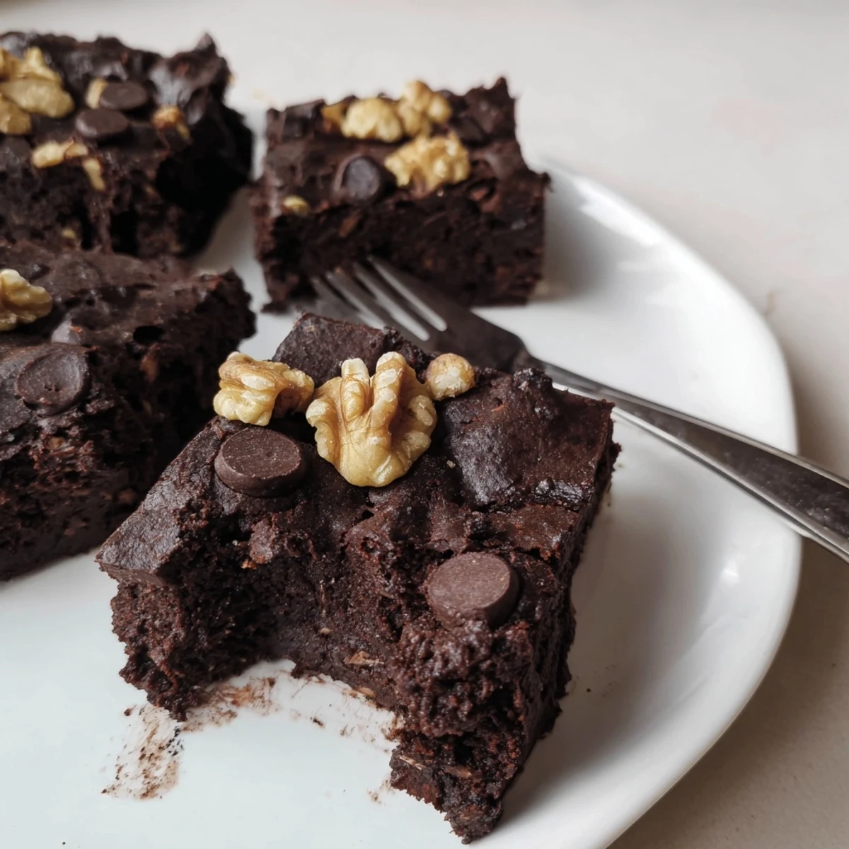 Decadent zero-waste brownies made from leftover nut-milk pulp, ideal for dessert.  