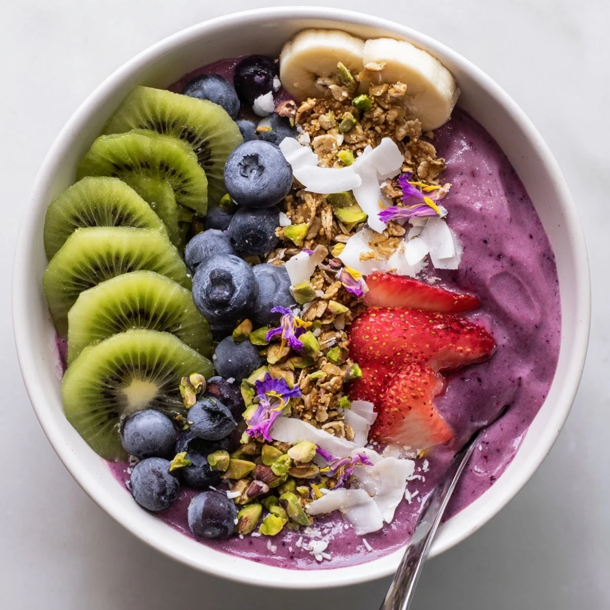 Vibrant Smoothie Bowls with unexpected twists, topped with fresh fruits and granola.  