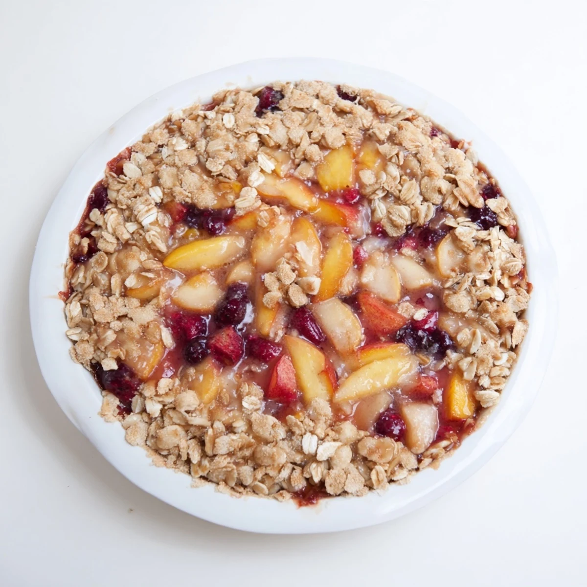 Crumbly oat topping covers a filling of frozen fruit in this easy, flavorful Fruit Crisp recipe.