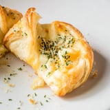 Melted cheese oozes from the savory, golden Crescent Roll Baked Cheese Bites, baked to a delicious crisp.
