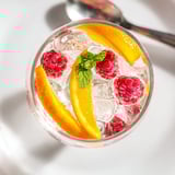 Glimpse the chilled, fizzy Sparkling Juice recipe, its sweet raspberries promising a delightful, celebratory sip.