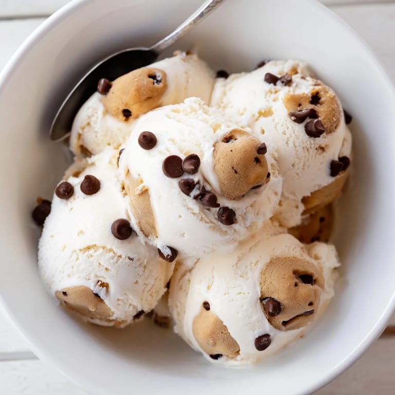 Indulge in Cottage Cheese Ice Cream, creamy texture with chewy cookie dough pieces.