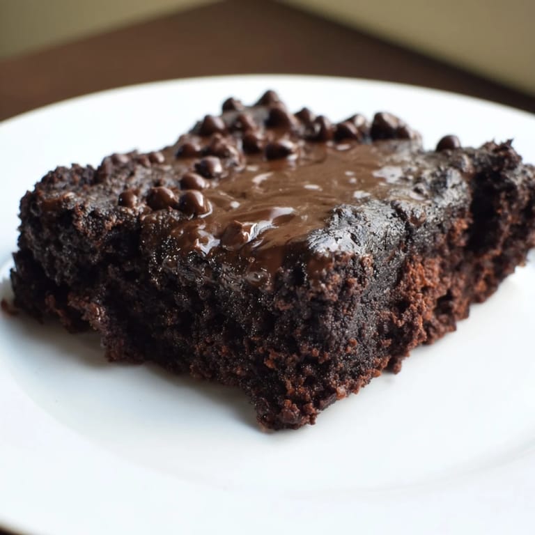 Homemade Black Bean Brownies, easily sliced in squares, a healthy and delicious dessert option.